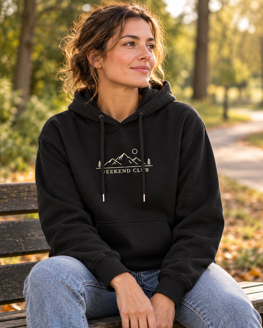 AI-created front-print custom hoodie lifestyle scene; design example, not a customer photo